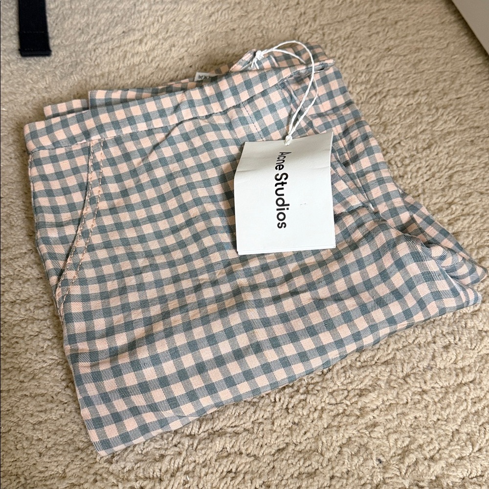 ACNE STUDIOS
Checked low-rise pants - Picture 2 of 7